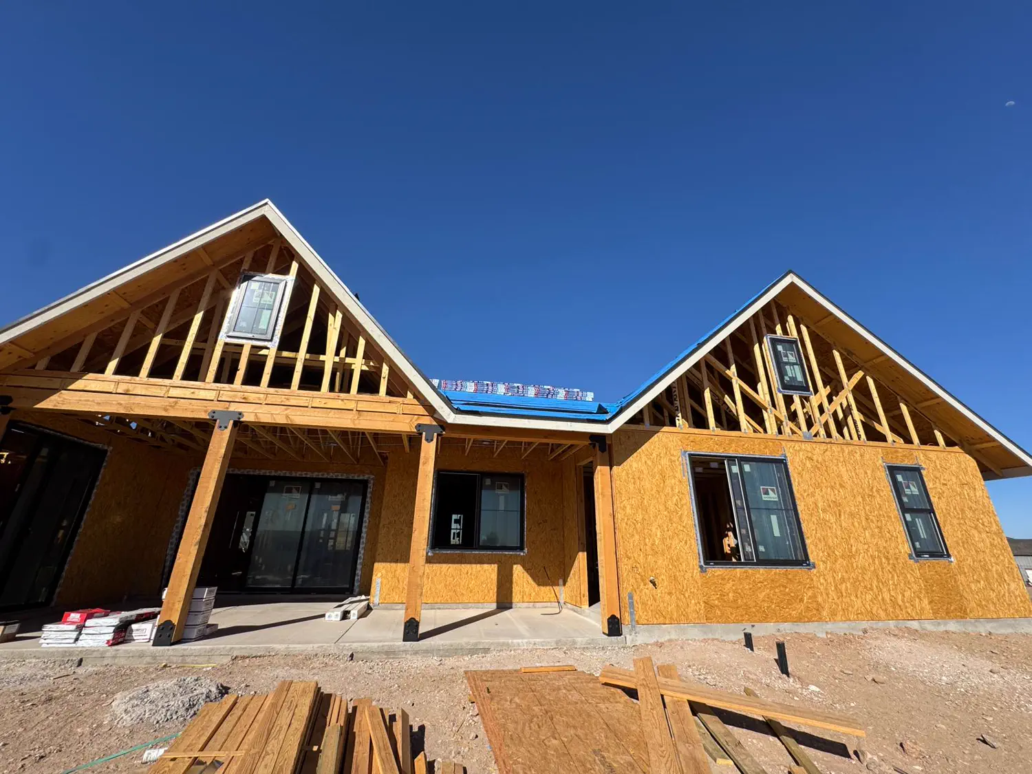 Gables, windows and wall sheathing on a Quest Construction custom home