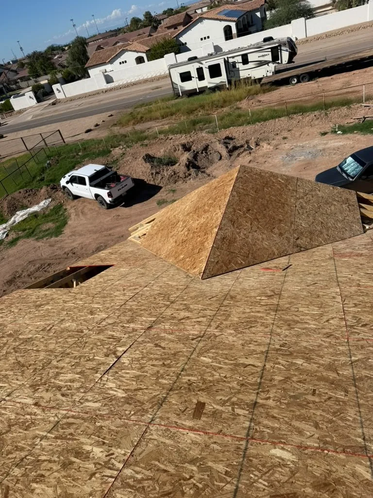 Roof deck with an opening framed into the sheathing