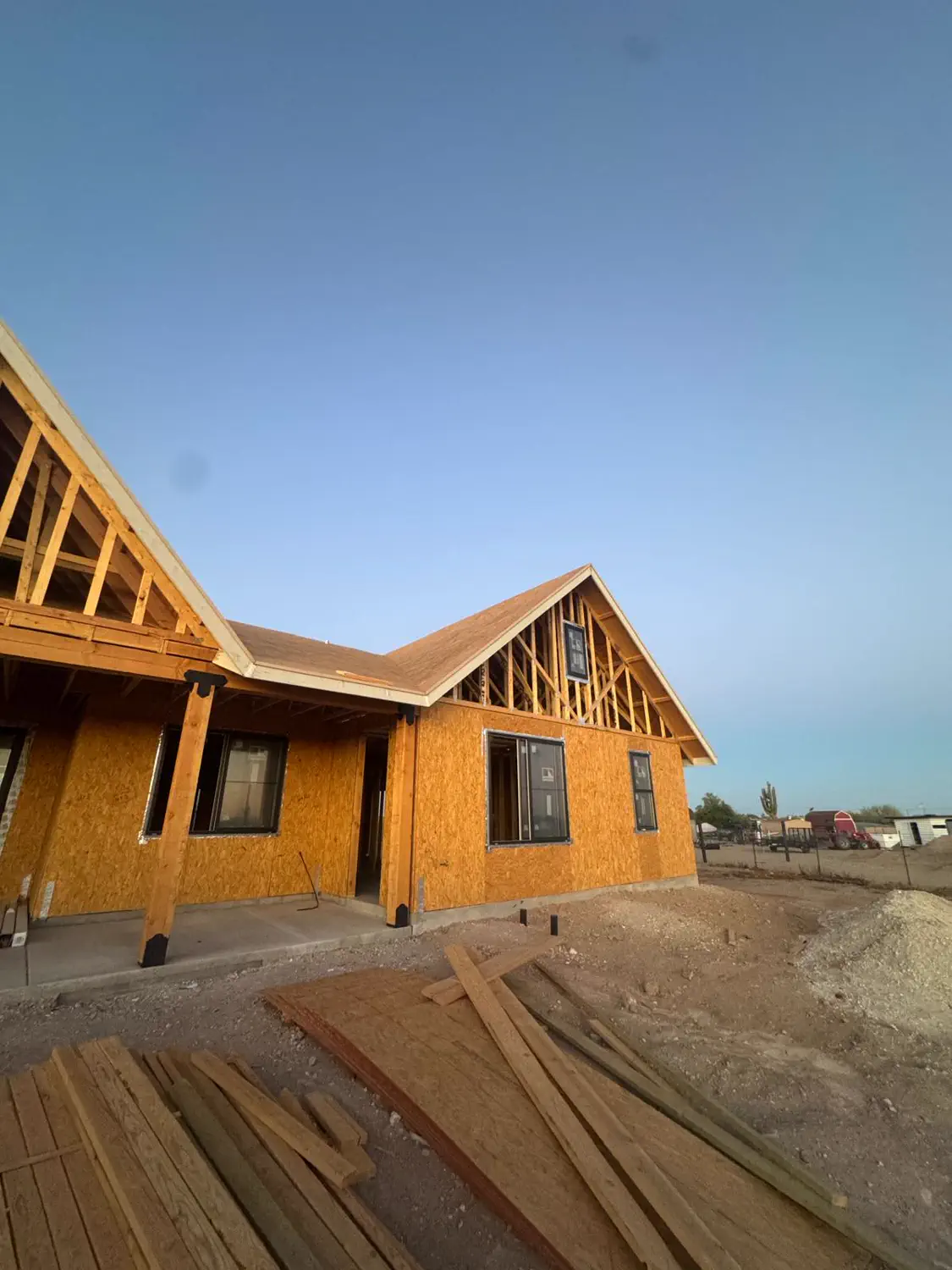 Windows set into the sheathed walls of a custom home