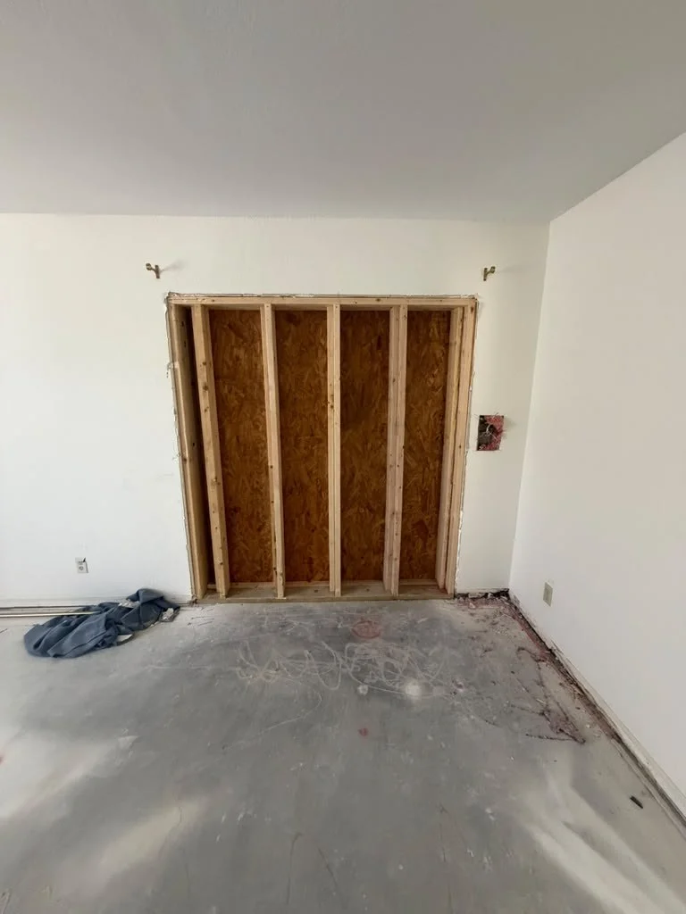 A newly framed doorway in an existing home