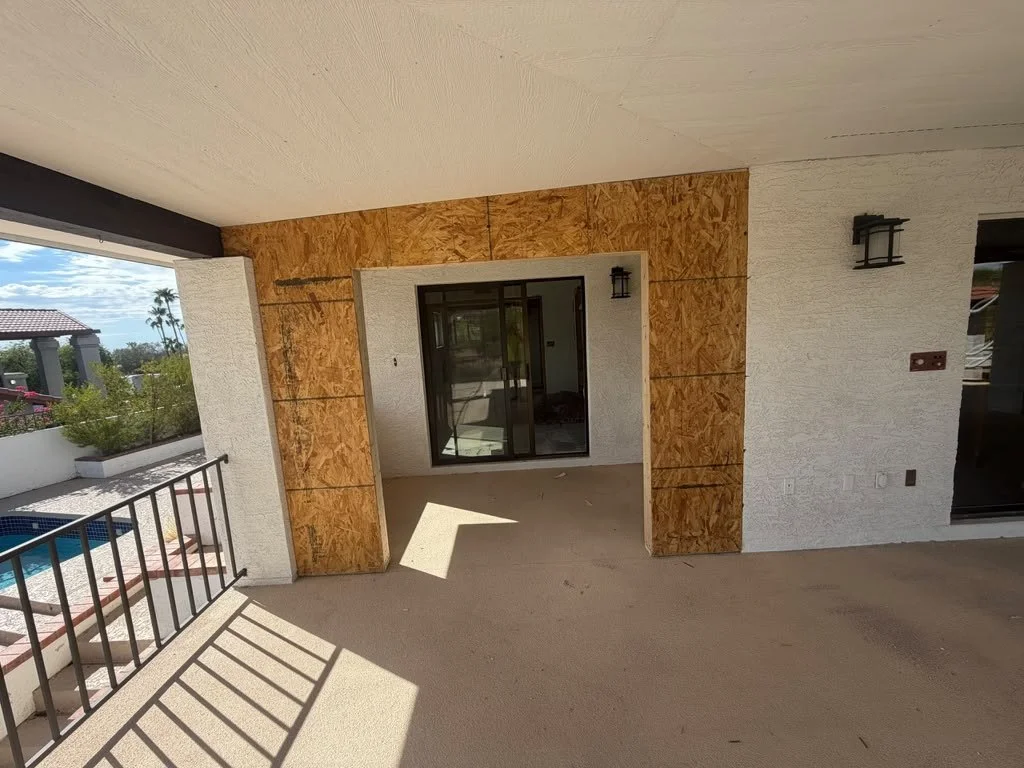 Wide opening from an interior remodel toward the covered patio