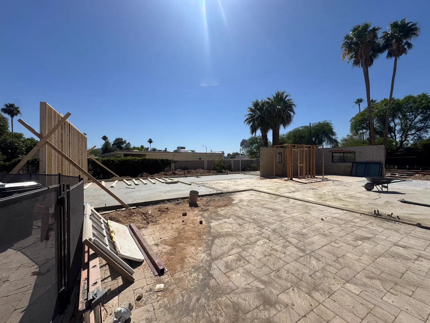 A finished slab and block wall at the start of a Quest Construction build