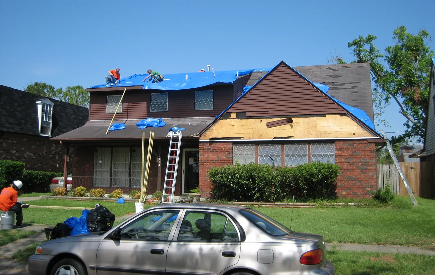 A roof opened up and covered over with sheeting